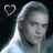 A pixelated image of a person with light hair against a dark background, overlaid with bright pink text and a heart symbol.