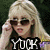 A blonde woman with sunglasses adjusts her glasses in a four- , with the bottom-right blank
