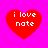 Four red heart shapes on a bright pink background, each containing white text reading "i love nate" in pixelated font.