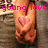 Pixelated image of a hand with a heart tattoo, overlaid with pink text reading 'young love' against a blurred background.
