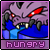 Pixelated purple monster with red eyes and sharp teeth, wearing blue clothing, displayed in a of