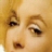 Static 48x48 pixel icon showing a close-up of two human eyes with visible eyelashes and eyebrows against a yellow background, rendered in low-resolution pixel art style.