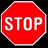 Two red octagonal stop signs side-by-side on black background, left sign displays 'STOP' text only, right sign has additional 'BUSH' text below 'STOP'.
