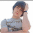 A pixelated image of a person with dark hair wearing a gray shirt, resting their head on their hand against a white background, with red text on pink and gray