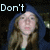 A four- shows a person in a blue hooded garment with long brown hair, with text appearing sequentially