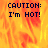 Pixelated text 'CAUTION: I'm HOT!' appears over a fiery orange-yellow background with a gray rectangular section on the right.