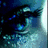 A pixelated close-up of a blue-eyed character's face with the word 'believe' in cyan text on the right side.