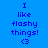 Blue background with pixelated text "I like flashy things! <3" in dark blue, displayed across three with light blue highlight bars shifting horizontally