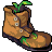 Pixel art boot with brown leather texture, three white eyelets, green laces, and a small green plant sprouting from the top, set against a solid gray background.