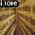 Two side-by-side pixelated images show a character with brown hair and a brown outfit against a textured background, with text above each image.