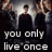 A pixelated image of a person in dark clothing standing among others with text overlay reading 'you only live' once.