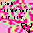 Pixelated text and heart symbols repeat across a pink, green, and yellow patterned background with no visible animation.