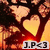 Pixelated image of two heart shapes with a fiery background and text reading 'J.P<3' at the bottom.