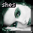 A pixelated image of a white skull with green eyes and dark green accents, displayed in a with text overlays