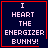 Four identical dark blue square with red borders display pixelated text reading "I HEART THE ENERGIZER BUNNY!"; two include a small red heart symbol and one includes a red starburst symbol