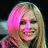 A pixelated image of a smiling person with blonde hair on the left, next to bright pink background sections containing text.