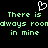 Pixelated green text on black background with white heart symbol above, displaying repeated phrases.