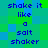 Pixelated text reads "shake it like a salt shaker" in blue letters on a green and blue background with no visible animation changes