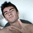 A pixelated image of a person with short dark hair, wearing a dark shirt, positioned next to red text reading "Its Me" and "Jeff Short" on black and gray backgrounds.