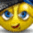 Yellow cartoon face with blue eyes, red mouth, and dark hair against a gray and blue background.