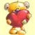 Pixelated teddy bear with golden-brown fur holds a large red heart against a pale yellow background.