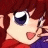 Pixelated anime-style character with red hair and large blue eyes, mouth open in a smile, against a black background with white text.