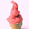 A single scoop of pink ice cream in a light brown waffle cone against a white background.