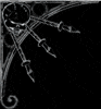 Black-and-white animated icon with ornate silver scrollwork and circular motifs, showing subtle motion in the lower right section.