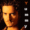 six shows a person with curly hair and stubble, each displaying the word 'Yummy' vertically in white text with one letter highlighted brown