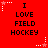 Red background with repeated text "I LOVE FIELD HOCKEY" in black pixelated font, surrounded by white and pink star-shaped border elements.