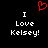 Red pixelated heart symbol above white text reading "I Love Kelsey!" on black background.