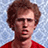 Pixelated image of a person with brown hair in red shirt against blue background, text overlays read "Gosh!", "What The Flip?", and "You're Such An Idiot!".