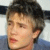 A 3x3 contact sheet of an animated AIM buddy icon featuring a photo of Chad Michael Murray and repeated "i love" text in various styles, with the name "Chad michael murray" visible on one frame.
