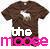 Pixelated static icon showing a brown T-shirt with white text and pink stylized text below, on a transparent background.