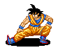 Pixel art of a character in an orange and blue martial arts uniform crouching with one leg extended, black hair spiked upward, eyes closed.