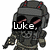 Pixelated character in dark tactical gear with red accents, holding a pistol, displayed in a with text overlays