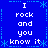 Blue background with white pixelated text reading "I rock and you know it" arranged in a pattern, bordered by light blue asterisk-like symbols