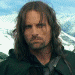 Animated sequence showing a character with long brown hair transitioning to white hair, wearing dark green clothing against snowy mountain background.