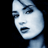 Pixelated grayscale close-up of a person's face in profile view against black background, with visible dithering and anti-aliasing artifacts on facial features.