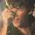 Animated icon shows a person singing into a microphone with two identical heart-shaped images of a group of people, alongside text reading 'double inferno<3' and 'NICK JONAS <3'.