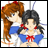 A 48x48 pixel animated contact sheet showing two anime-style female characters in school uniforms on the left and text elements on a black background on the right, with visible pixelation and dithering effects.