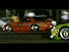 Animated contact sheet showing five sequential frames of a racing car animation with orange and green vehicles on a dark track background.