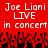 Red background with white pixelated text reading 'Joe Liani LIVE in concert' repeated twice, black and red pixelated crowd silhouettes below.