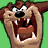 Animated Looney Tunes character sprites including a brown dog, red bird, and green alien with yellow helmets on green backgrounds.