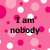 Pink background with white and pink circles, black text reading "I am nobody," "Nobody's perfect," and "There for I'm perfect," with a gray rectangle in the bottom right.