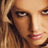 Pixelated close-up of a person's face with brown hair and light skin tone, rendered in low-resolution 48x48 pixels with visible dithering and color blending.