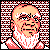 Pixelated static icon of a bald elderly man with white beard and glasses, framed by red-and-black checkered border on black background.