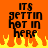Pixelated text on orange background with yellow flames at bottom, reading "ITS GETTIN HOT IN HERE" in black block letters.
