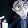 Animated character with pale skin and large eyes holds a lit candle in a dark setting.
