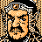 Pixelated static icon featuring a stylized orange and black face with geometric patterns surrounding it, set against a transparent background.
